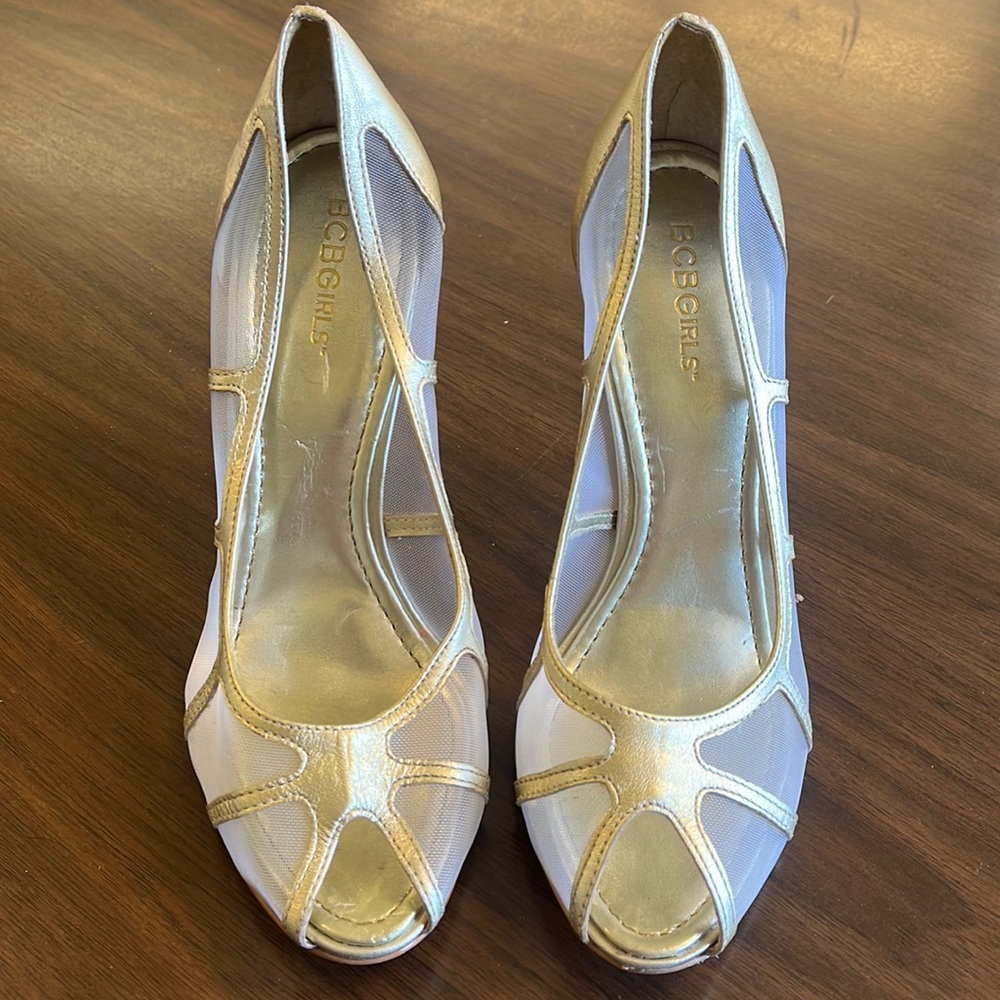 Woman’s gold heels